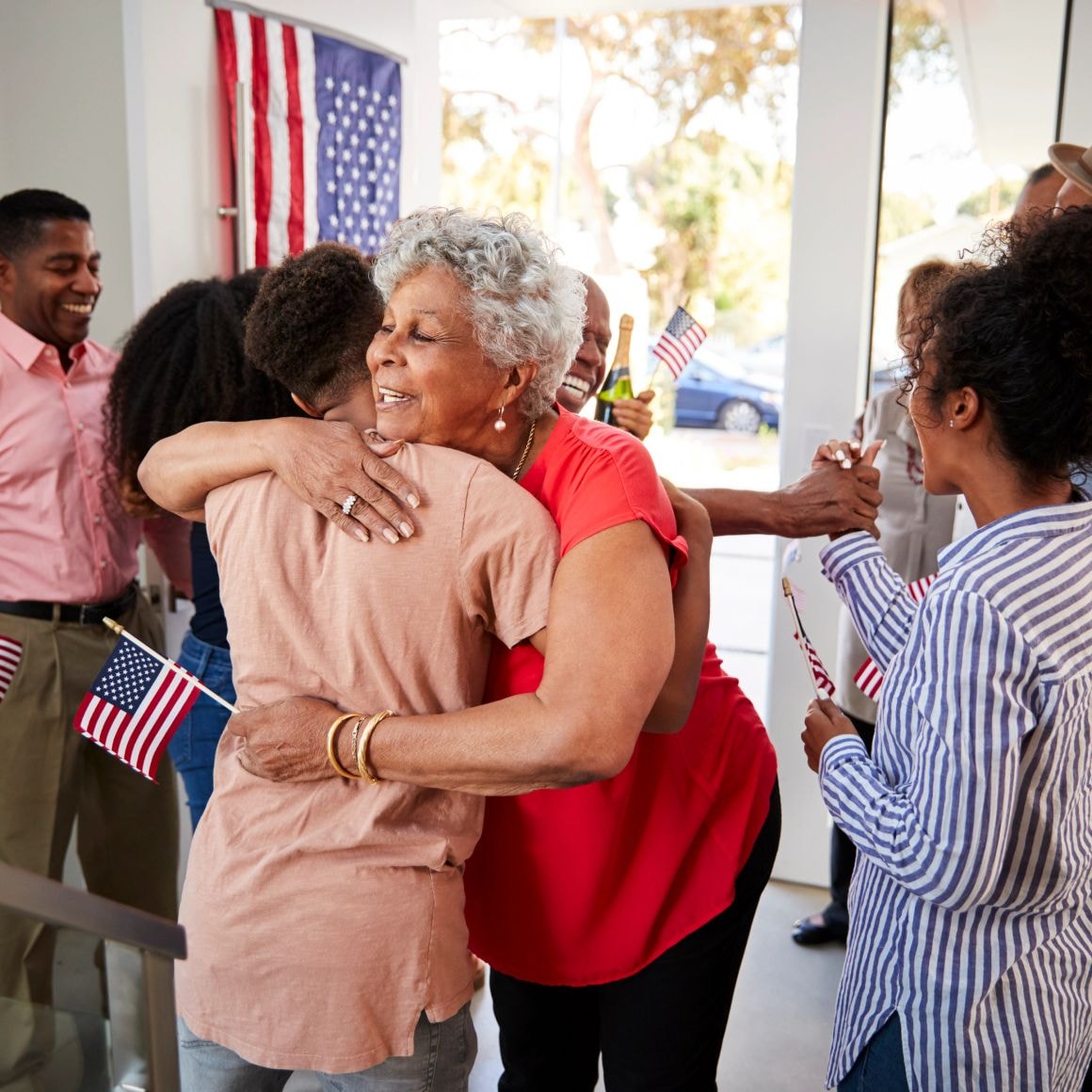 Family reunion celebrating with American flags